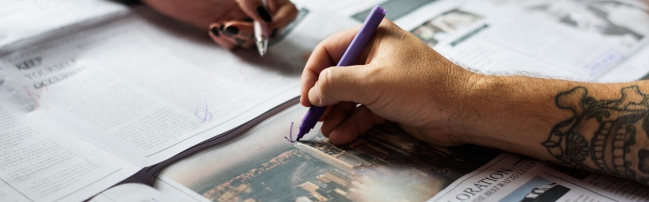 people-hands-checking-newspaper-working.jpg
