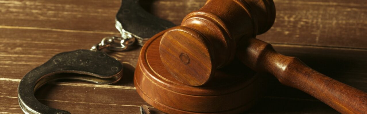 closeup-view-brown-wooden-mallet-judge.jpg