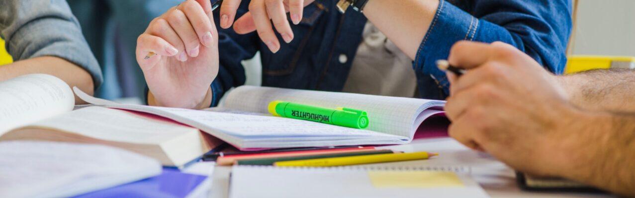 crop-girl-table-with-books.jpg