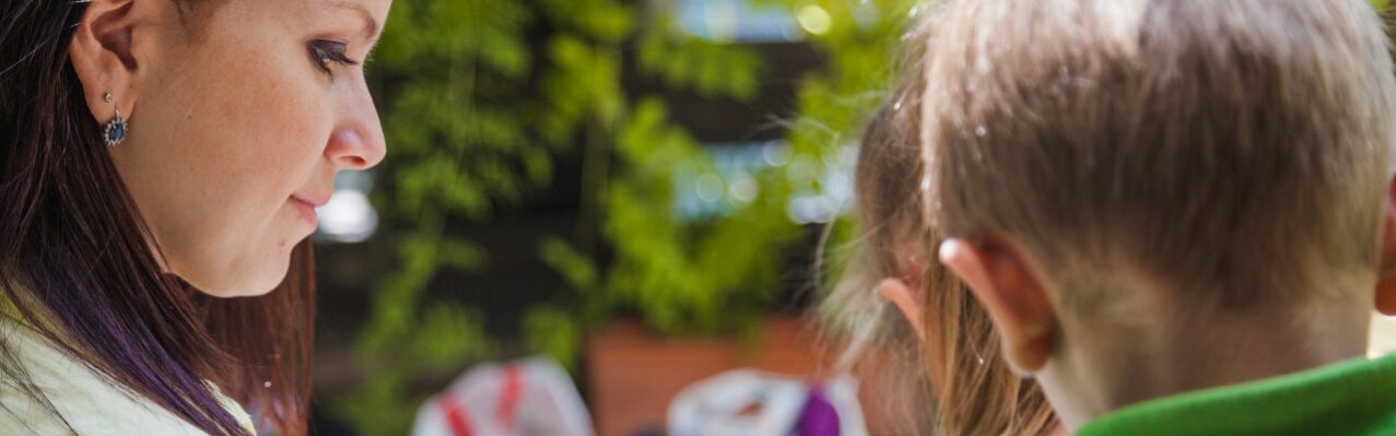 woman-with-children-reading-together.jpg
