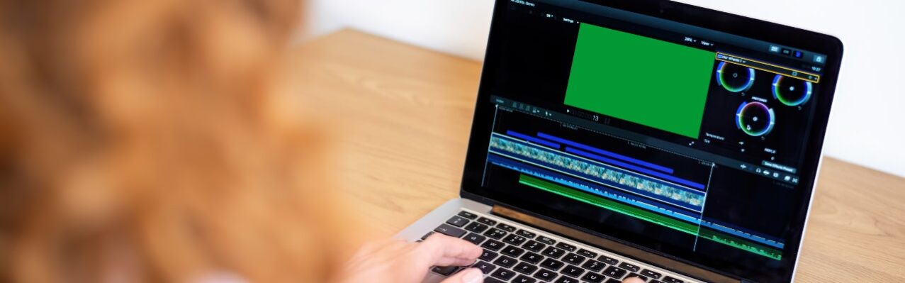 young-content-creator-girl-editing-video-her-laptop-working-from-home (1).jpg