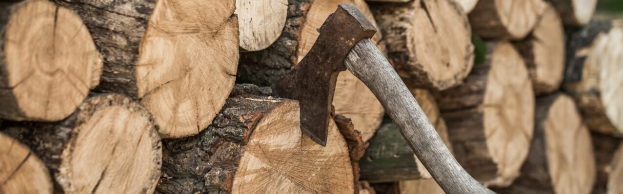 deck-stacked-logs-axe.jpg