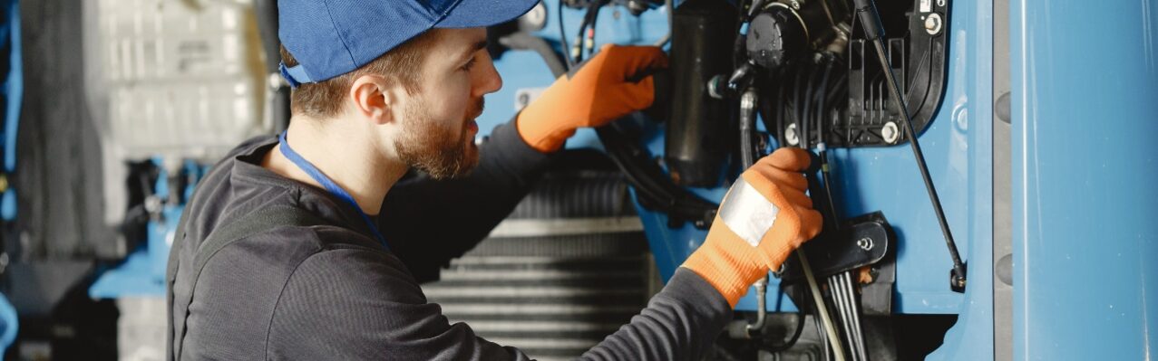 man-with-tools-truck-worker-uniform-faulty-truck.jpg