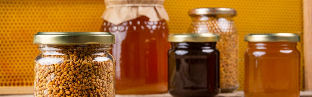 pollen-jar-with-honey-jars-honeycomb.jpg