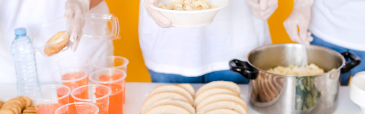 high-angle-people-preparing-food-donation.jpg